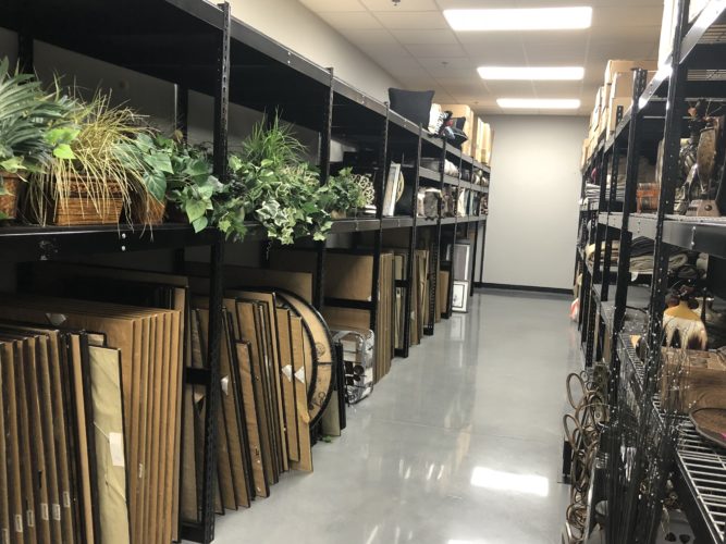 Inside the Corporate Connection warehouse with view of Decor items