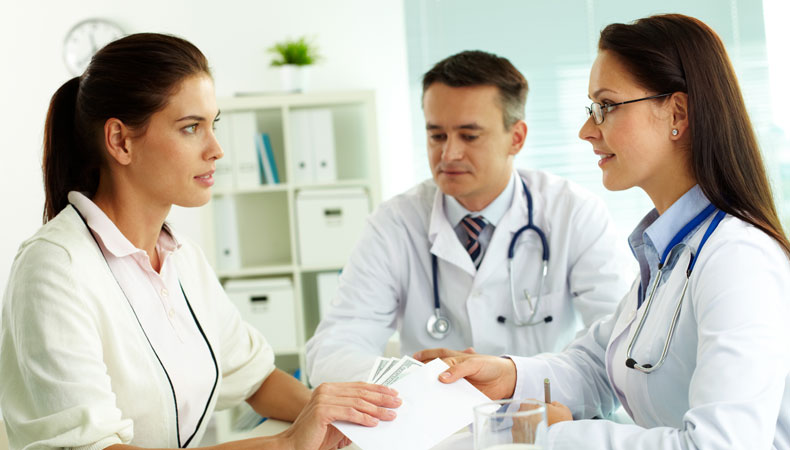 Three Healthcare Professionals working together